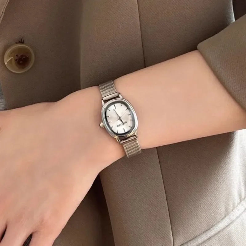 Lunarelle Small Oval Green Dial Watch – Simple Stainless Steel Quartz Wristwatch for Women