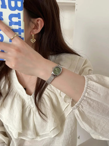 Lunarelle Small Oval Green Dial Watch – Simple Stainless Steel Quartz Wristwatch for Women