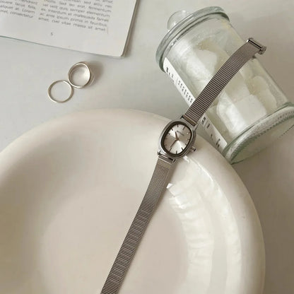 Lunarelle Small Oval Green Dial Watch – Simple Stainless Steel Quartz Wristwatch for Women