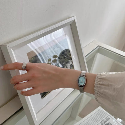 Lunarelle Small Oval Green Dial Watch – Simple Stainless Steel Quartz Wristwatch for Women